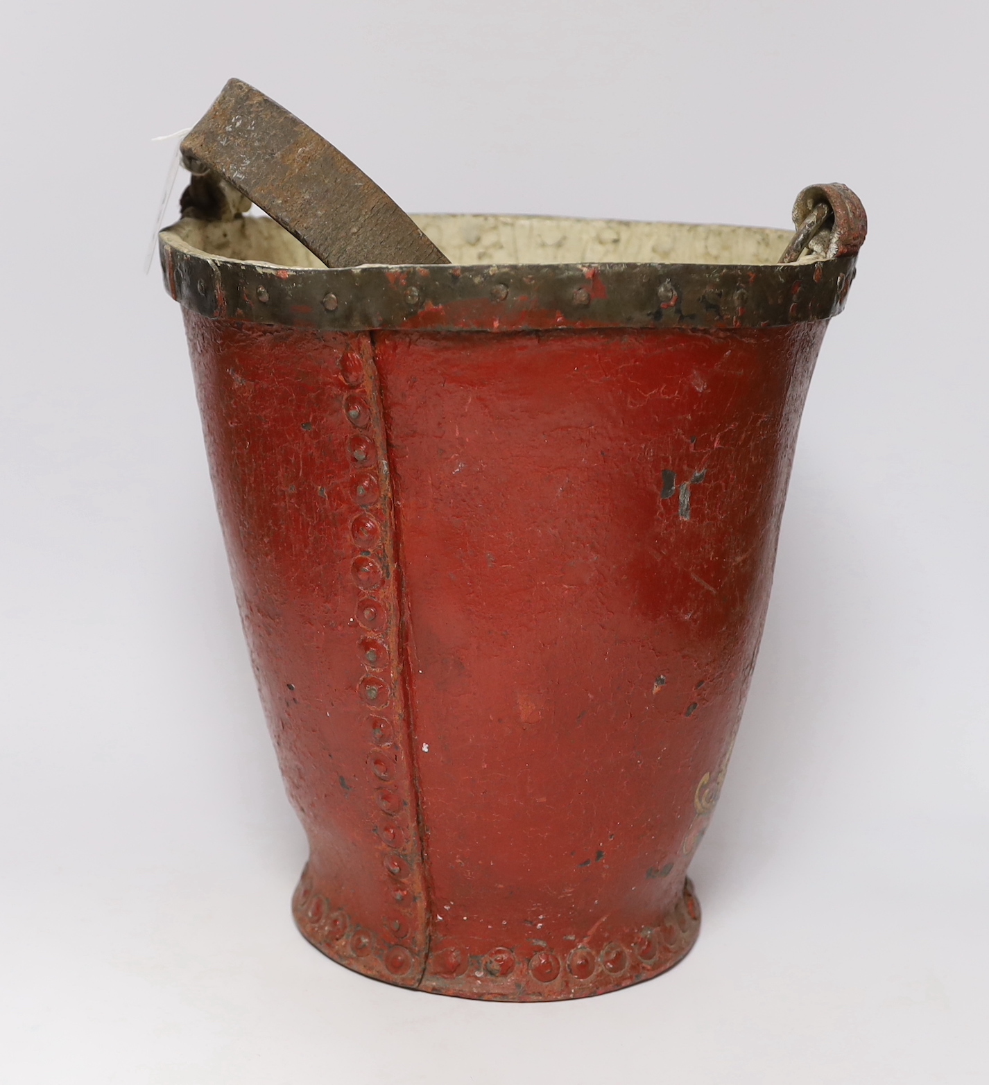 A 19th century red painted fire bucket decorated with royal crest, 32cm